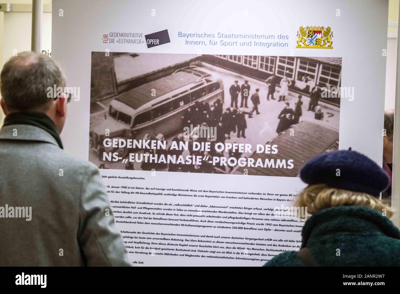 Munich, Bavaria, Germany. 18th Jan, 2020. Guests at an exhibition honoring the victims of the Nazi T4 Euthanasia program read the reconstructions of the lives of victims. Honoring the victims on the 80th anniversary of their categorization as 'unfit to live'' by the Nazi terror regime, the Bavarian Interior Ministry held a memorial program in connection with an exhibition at the Ministry. The National Socialist terror regime began the program near Munich and through it rounded up disabled and chronically ill people, declared them 'unfit to live'' then deported them to face execution. Stock Photo