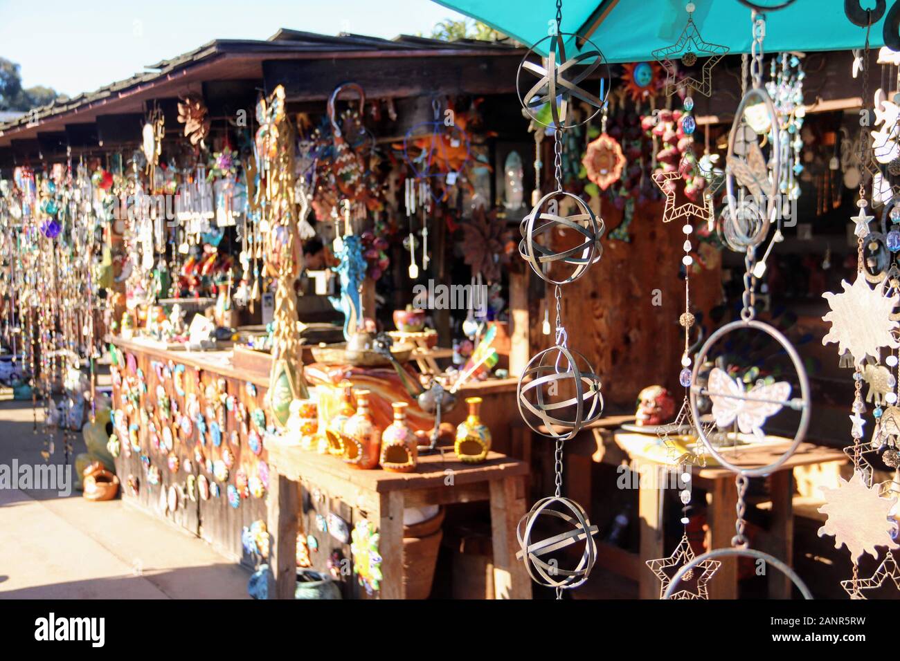 Wind chimes and Souvenirs on display at a stand in Old Town San Diego
