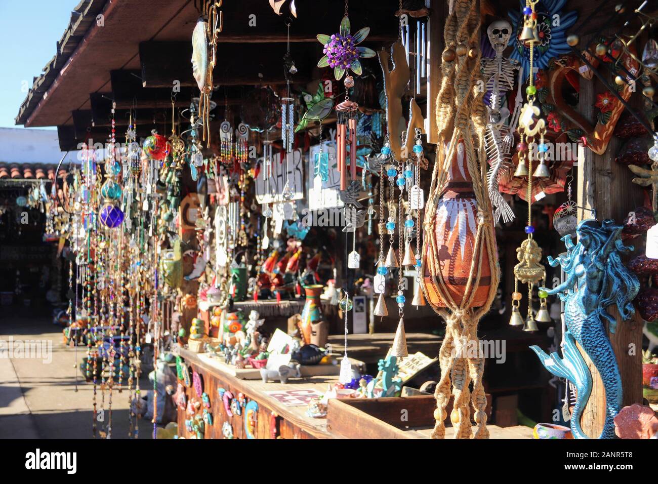 Wind chimes and Souvenirs on display at a stand in Old Town San Diego