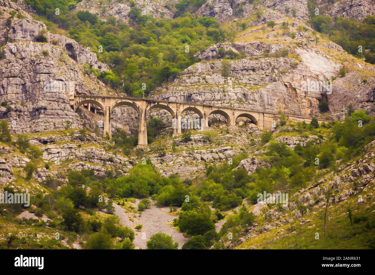 The view of old high mountain breathtaking railway viaduct or mountain bridge of old railway in MONTENEGRO, Europe Stock Photo