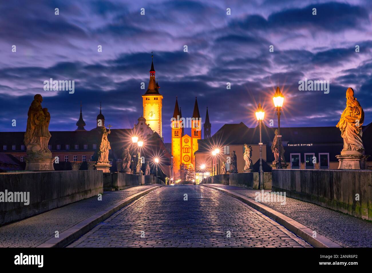 Old Main Bridge, Alte Mainbrucke with statues of saints, Cathedral and City Hall in Old Town of Wurzburg, Franconia, Bavaria, Germany Stock Photo