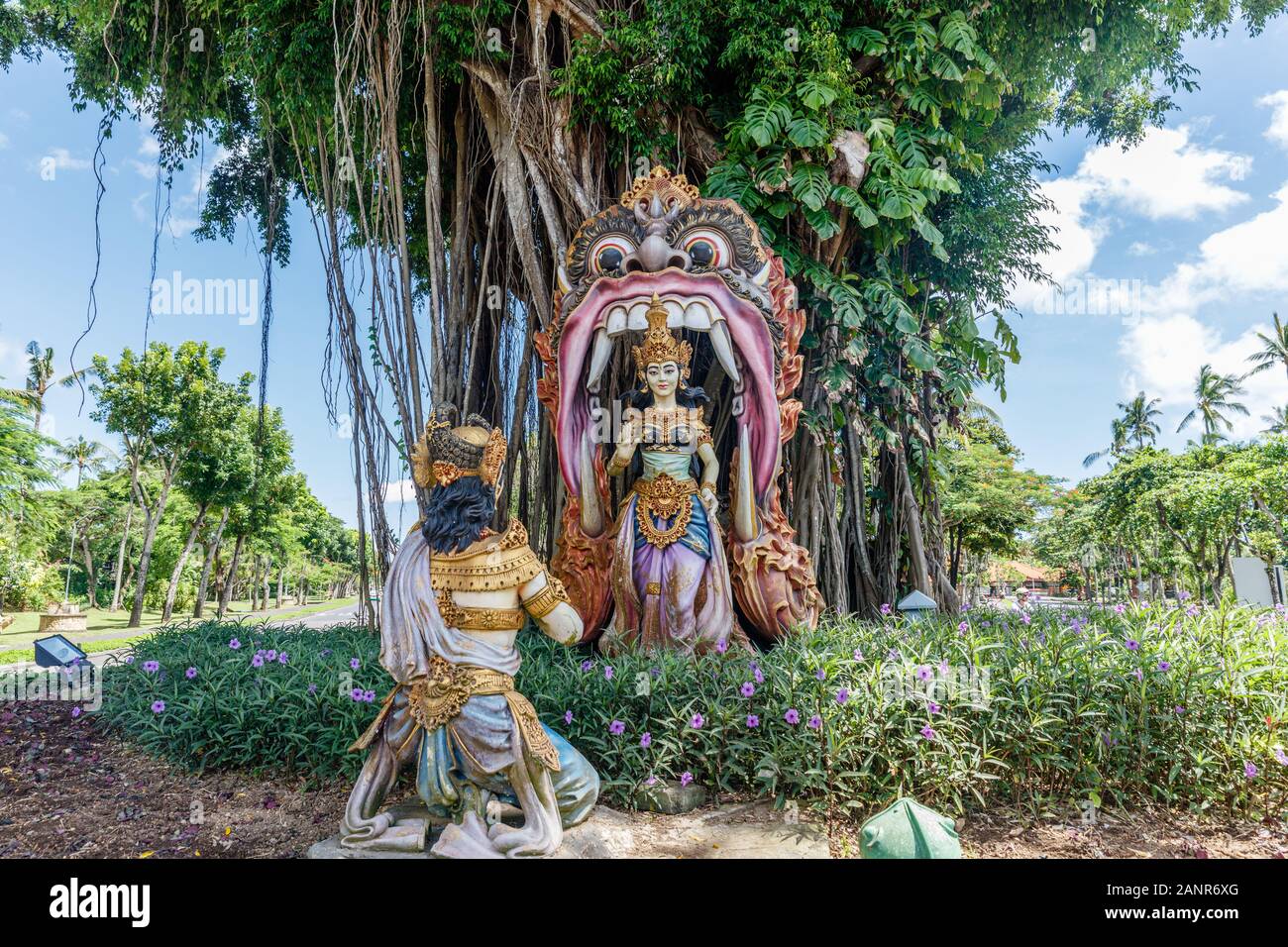 Green garden and statues in Nusa Dua area, Bali, Indonesia Stock Photo
