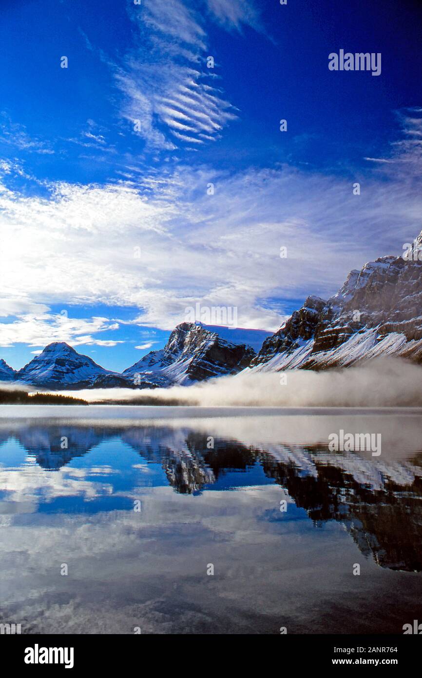 Early morning mist on Bow Lake, Banff National Park, Alberta Canada Stock Photo
