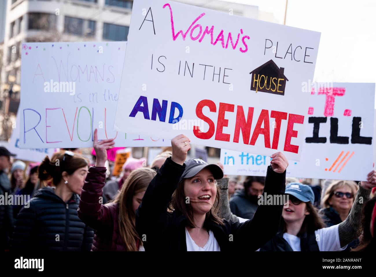San Francisco, USA. 18th January, 2020. The 4th annual Women's March San Francisco, California. A woman carries a sign reading, 'A woman's place is in the house and senate.' Stock Photo
