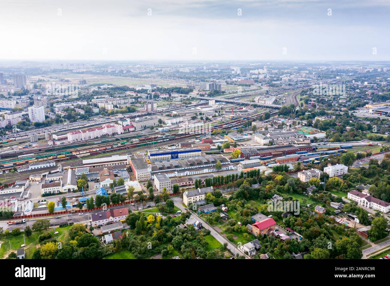 aerial panoramic view of city industrial area with railway hub. freight trains for cargo transportation. Minsk, Belarus Stock Photo
