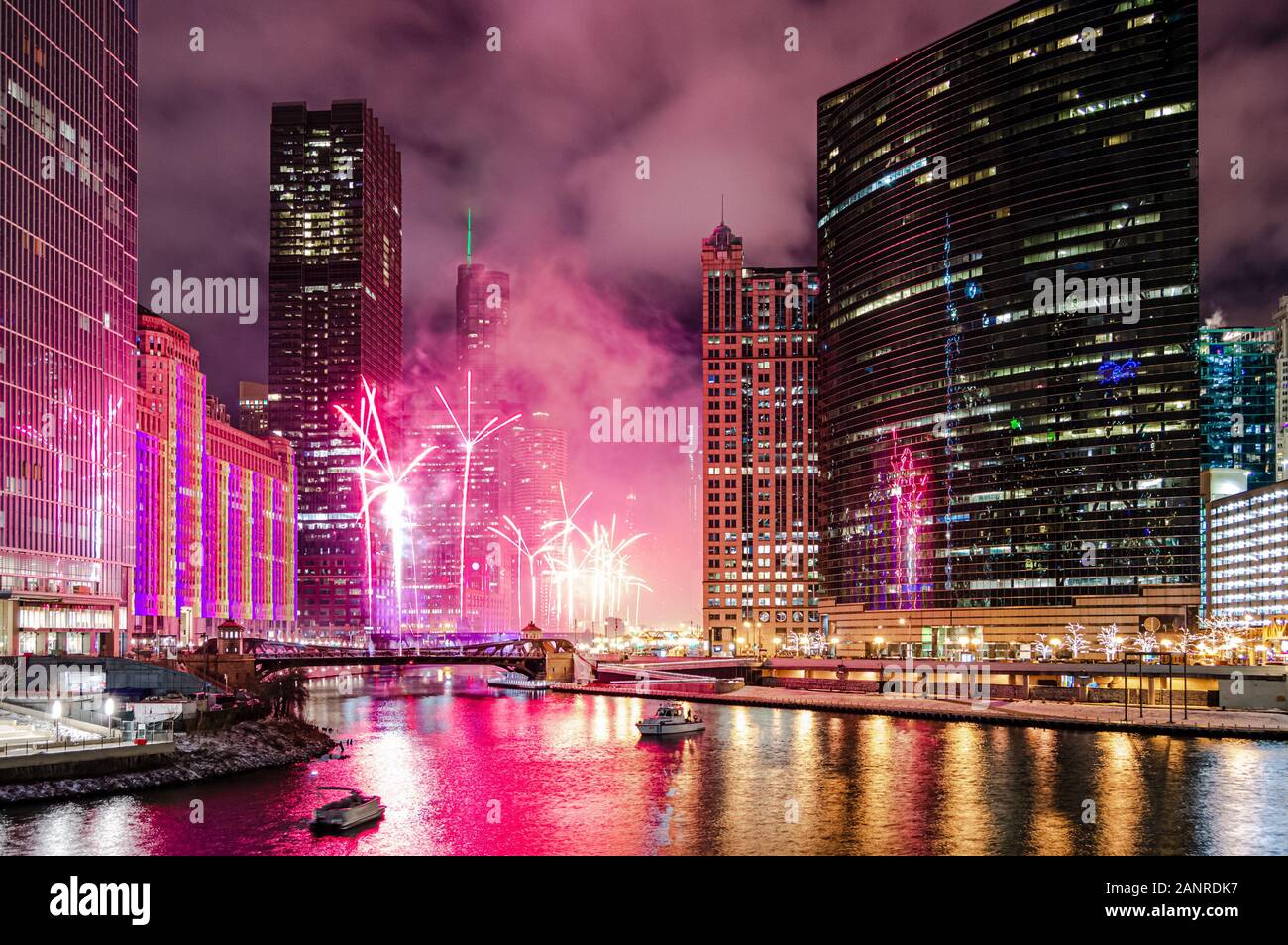 A beautiful celebration with fireworks near the Chicago River at Wolf Point in Chicago, Illinois Stock Photo