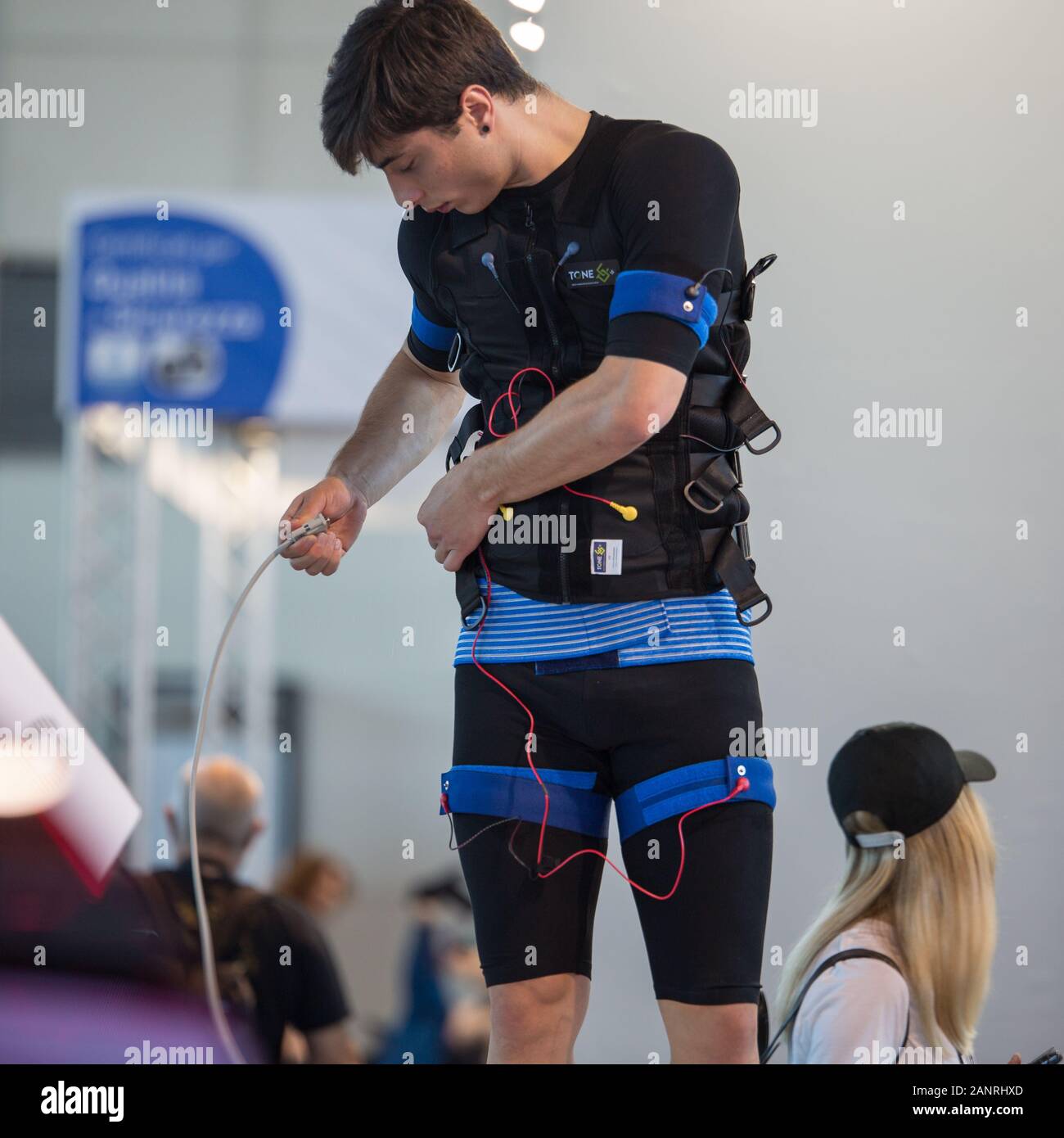 Boy Wearing Black Jacket with Electrode Muscular Electrostimulation