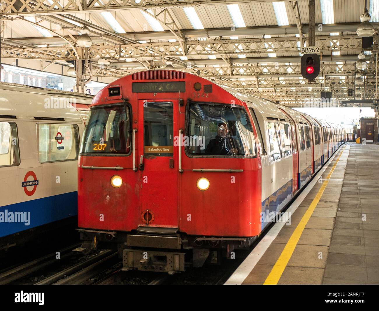 Tube train on The Bakerloo Line at Queens Park station in London. Stock Photo