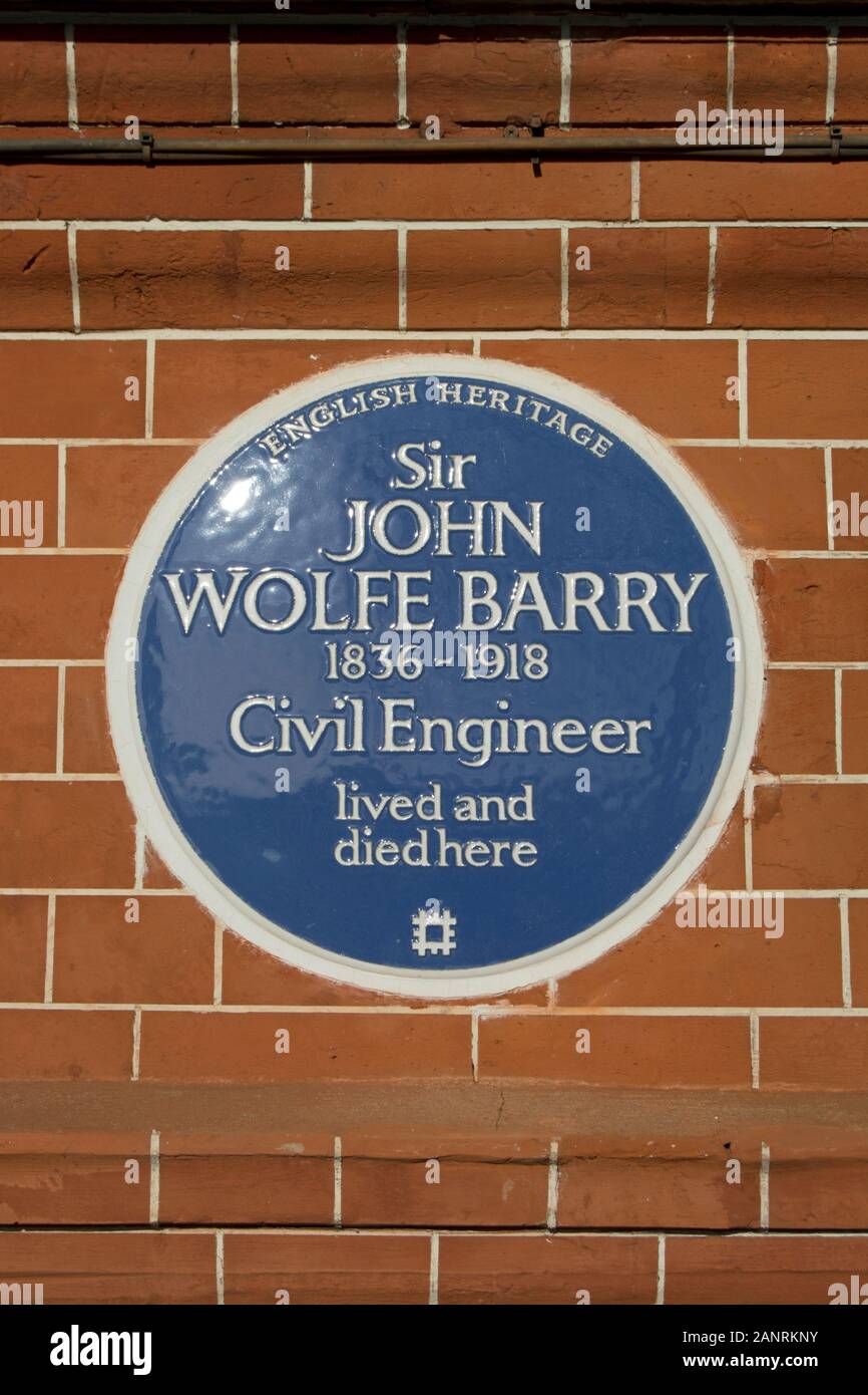 english heritage blue plaque marking a home of civil engineer sir john wolfe barry, chelsea embankment, london, england Stock Photo