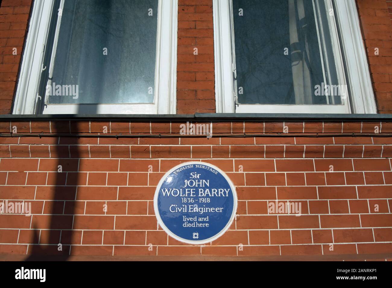 english heritage blue plaque marking a home of civil engineer sir john wolfe barry, chelsea embankment, london, england Stock Photo