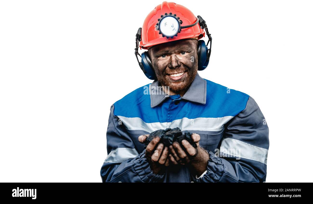 Miner happy man smiling after working on coal mine. Concept industrial ...