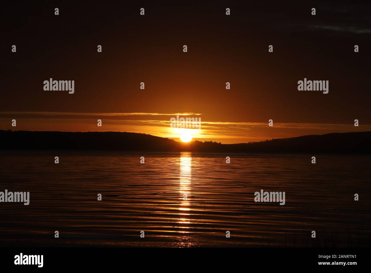 Dundee, UK. 19th January 2020. Sunrise over Invergowrie Bay near Dundee. A dramatic start to another cold day in Tayside.  © Stephen Finn/Alamy Live News Stock Photo