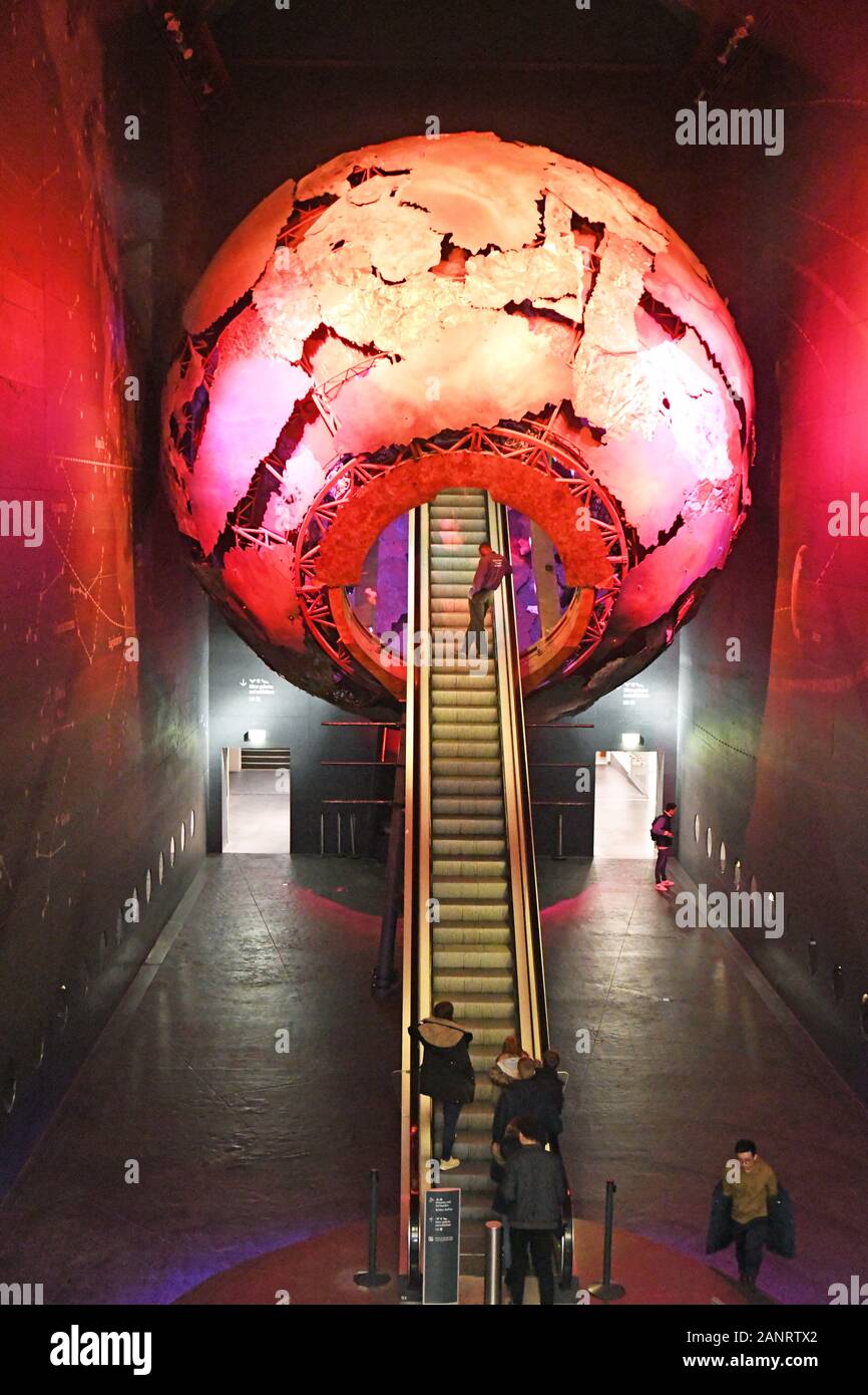 The Earth Hall with its red globe escalator, in the Earth Galleries, Red Zone, at the Natural History Museum, London, England, UK Stock Photo