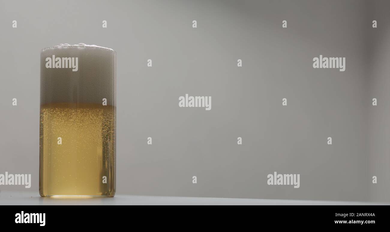 Apple Cider In Glass On Terrazzo Countertop With Copy Space Wide