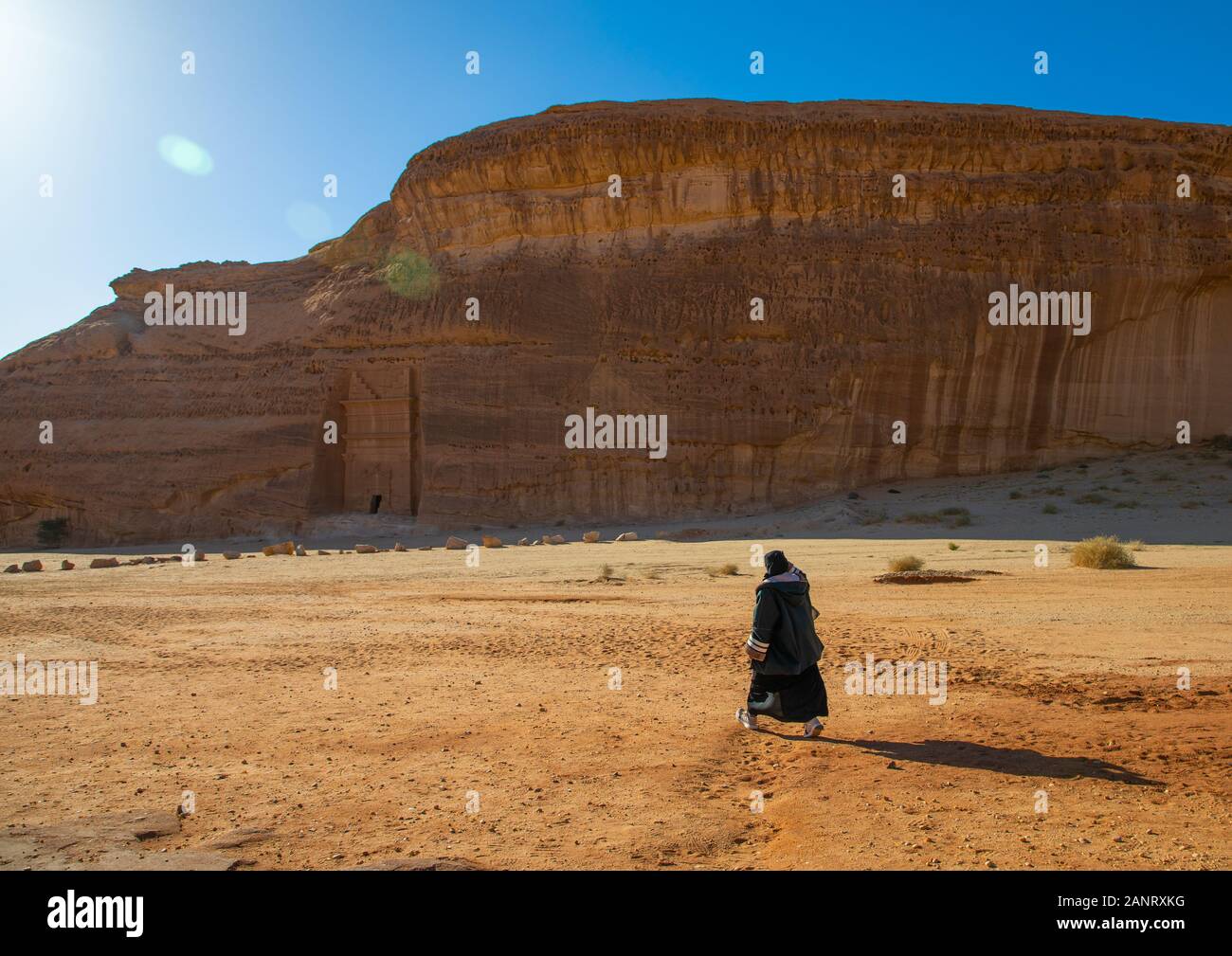 Saudi woman in niqab in the desert of Madain Saleh, Al Madinah Province, Alula, Saudi Arabia Stock Photo