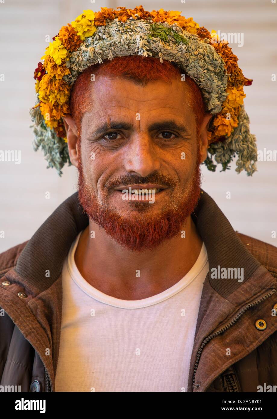Portrait of a flower man wearing a floral crown on the head, Jizan