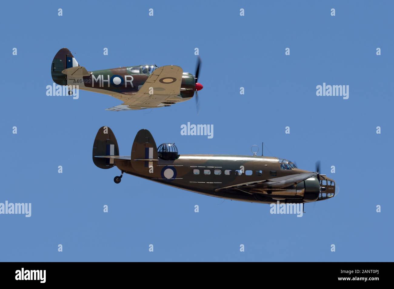 Lockheed Hudson twin engine light bomber and coastal reconnaissance aircraft flying in formation with Commonwealth Aircraft Corporation Boomerang figh Stock Photo