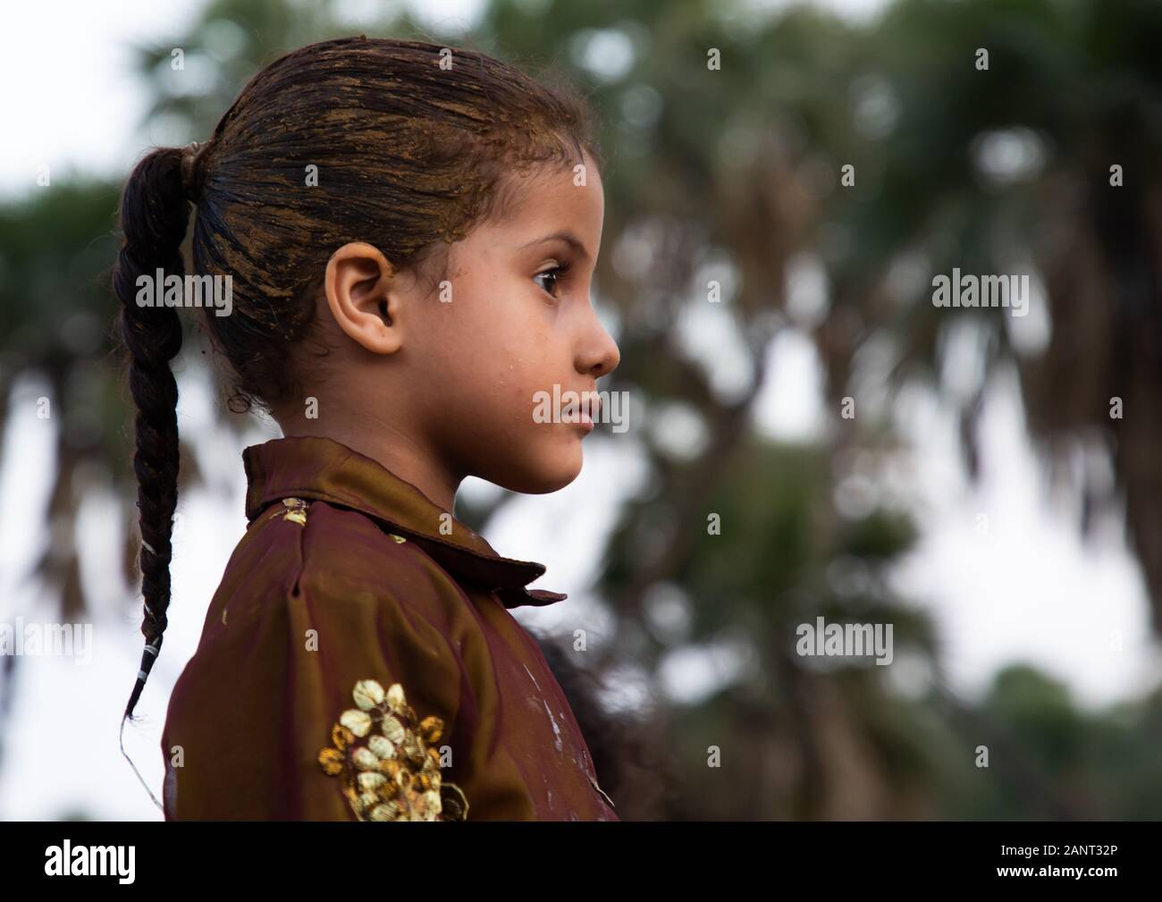 Portrait of a saudi girl with henna in the hair, Jizan province, Alaydabi, Saudi Arabia Stock Photo