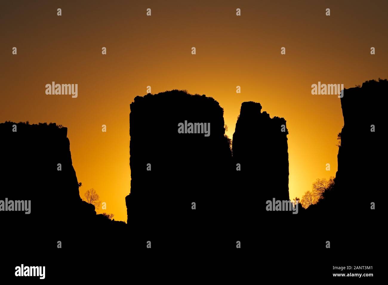 Rock silhouettes at sunset, Valley of desolation, Camdeboo National Park, South Africa Stock Photo