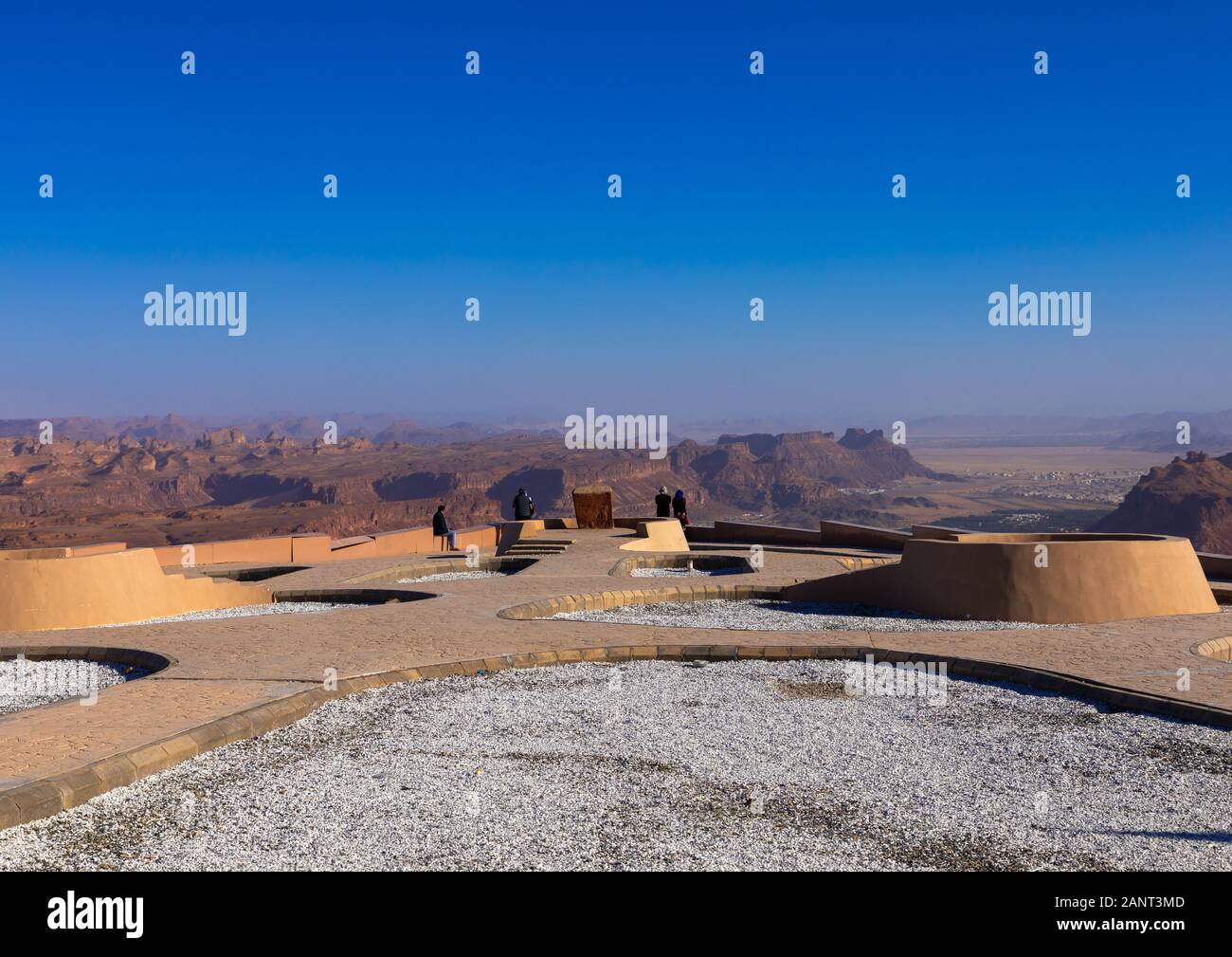 Tourists watching the oasis in the middle of the wadi alQura, Al