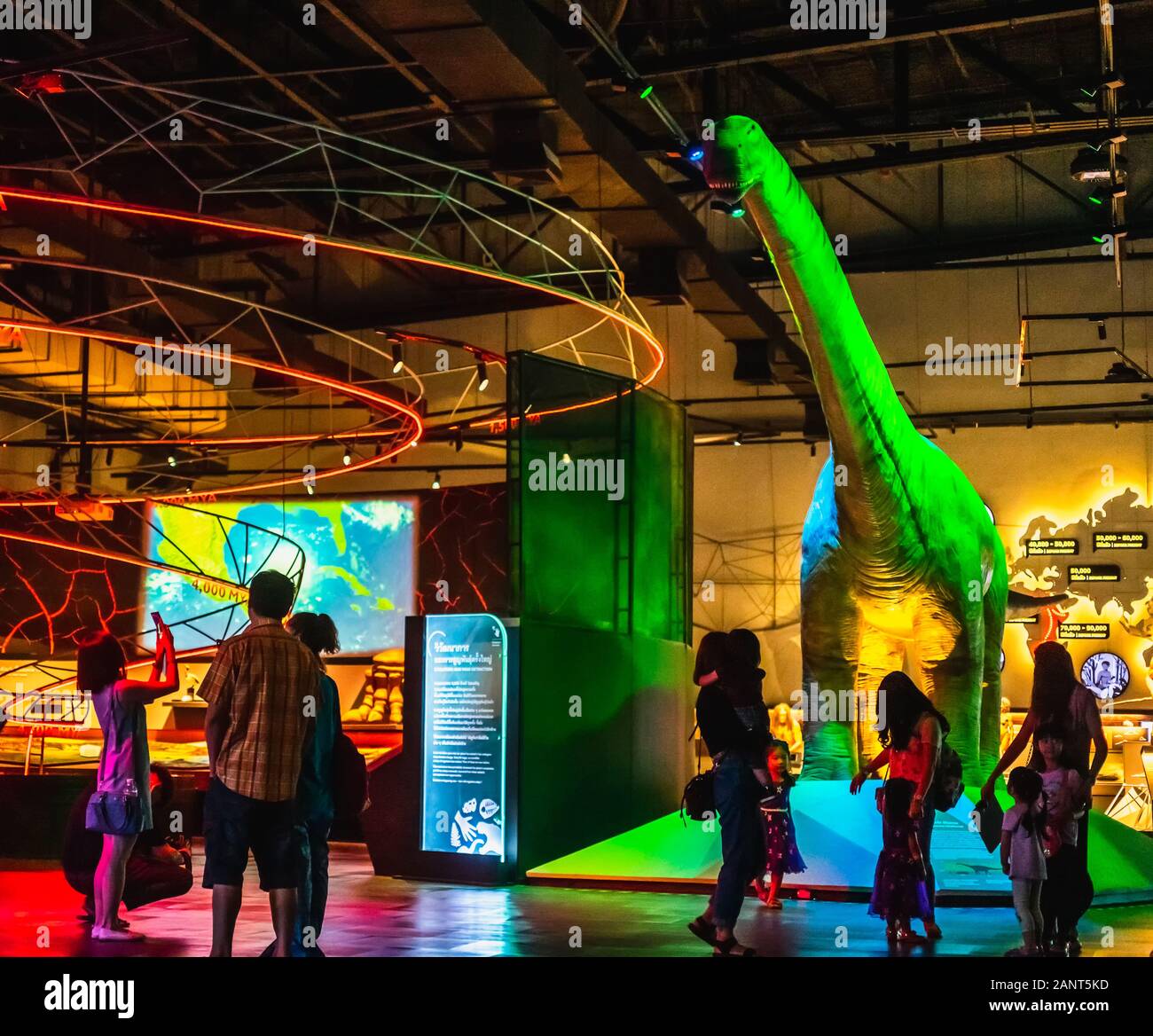 Pathum Thani, Thailand - January 19, 2020: Tourists see a big dinosaur at the National Science Museum (NSM), Thailand. The National Science Museum is Stock Photo