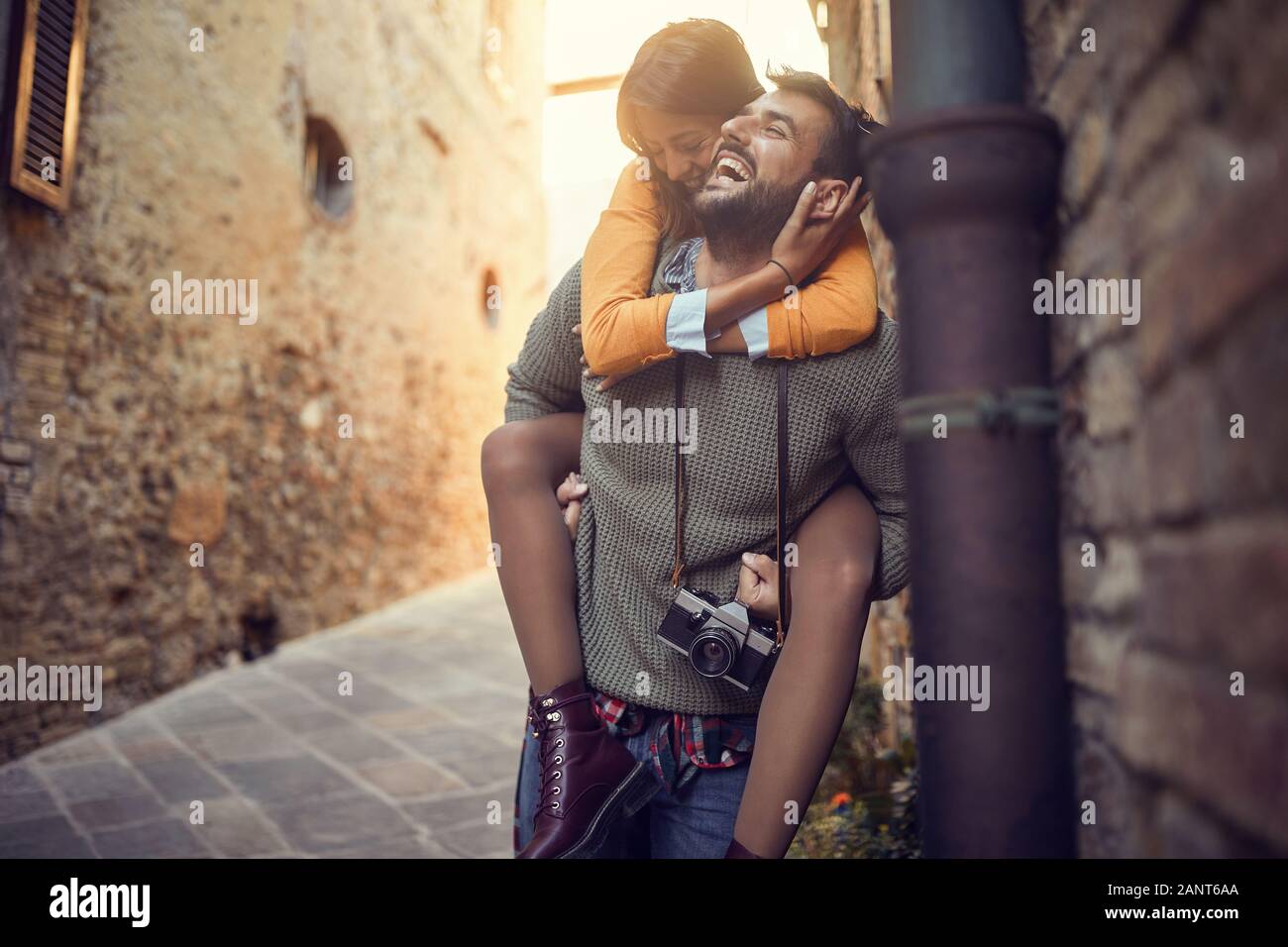 Young Man and woman have fun  on the streets of Italy Stock Photo