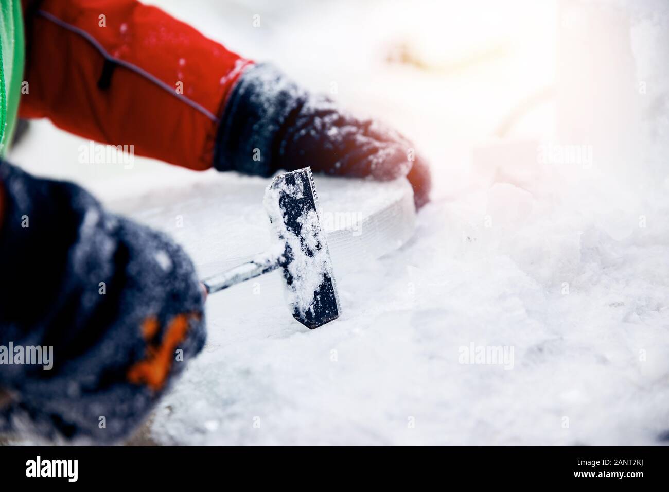 Ice sculpture carving man use chisel cut frozen winter Stock Photo Alamy