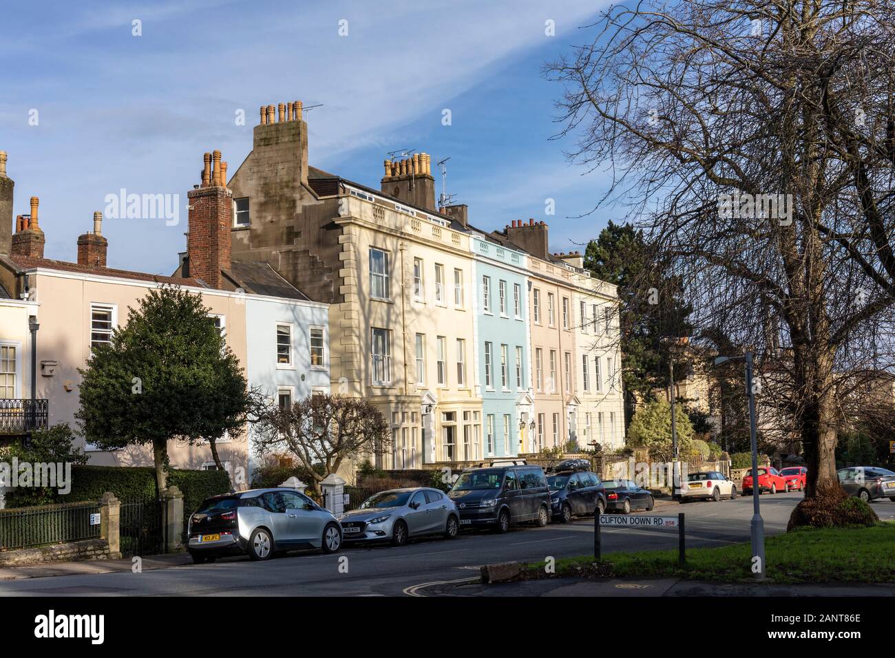 Pastel coloured terraced period houses in Clifton Down Road, Clifton