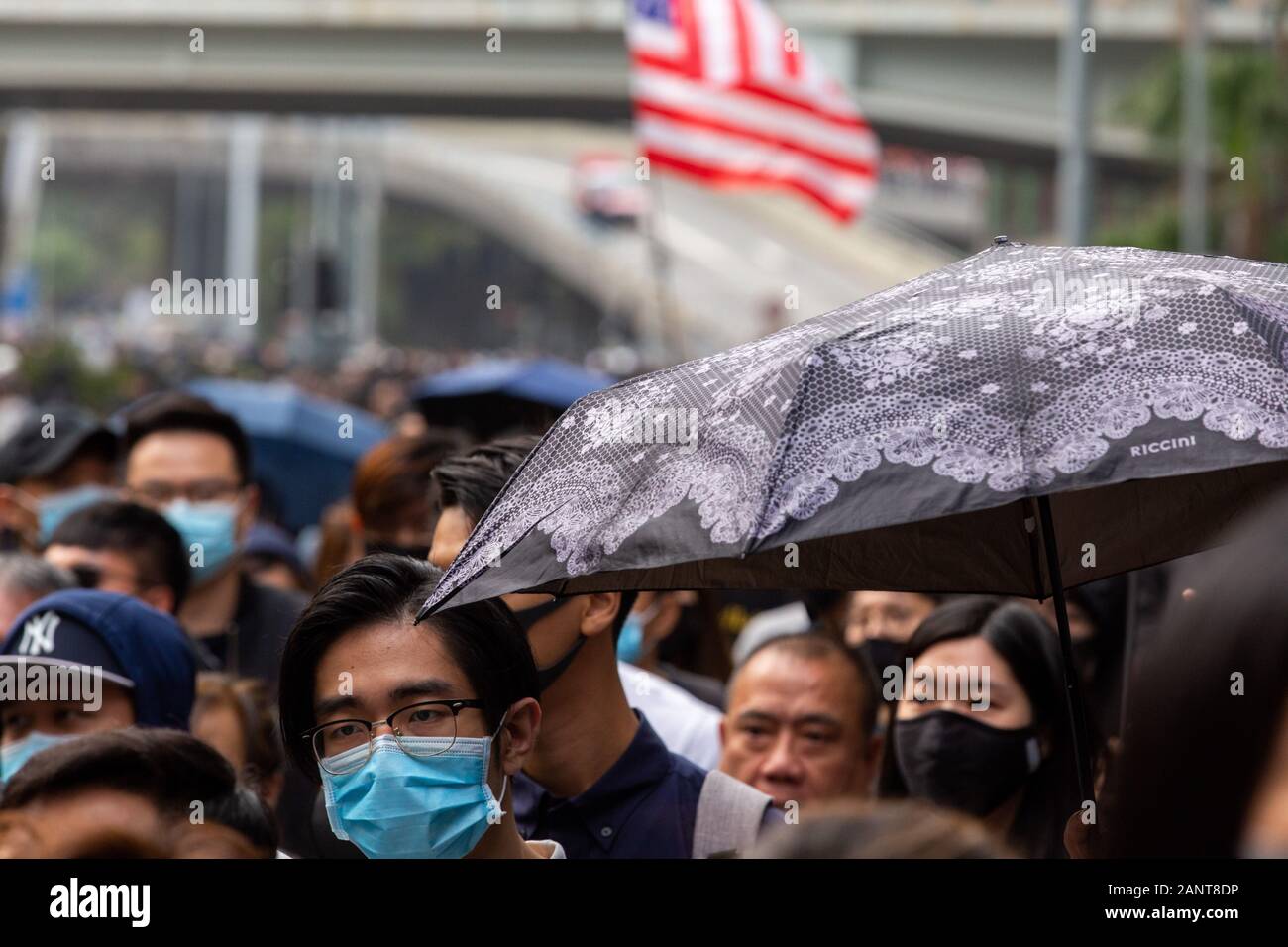Hong Kong, China. 19th Jan, 2020. Crowd on the move trying to march to Wanchai but the Police stopped them at Admiralty. Hong Kong Protest - Universal Seige on Communists Rally at Chater Garden, Central, Hong Kong. Credit: David Ogg/Alamy Live News Stock Photo