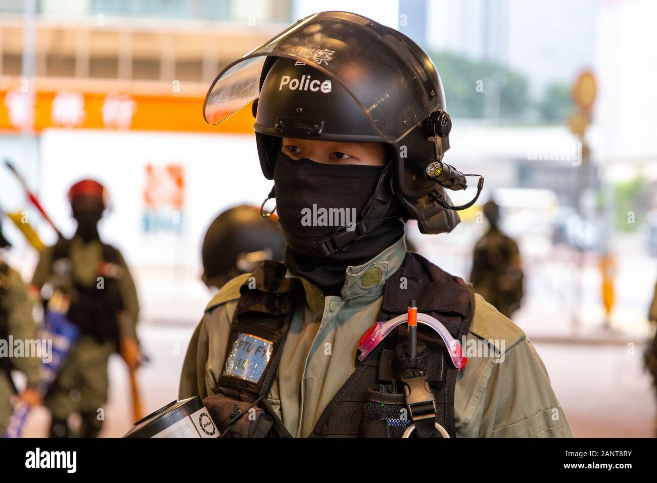 Hong Kong, China. 19th Jan, 2020. Police officer at the Hong Kong Protest - Universal Seige on Communists Rally at Chater Garden, Central, Hong Kong. Credit: David Ogg/Alamy Live News Stock Photo