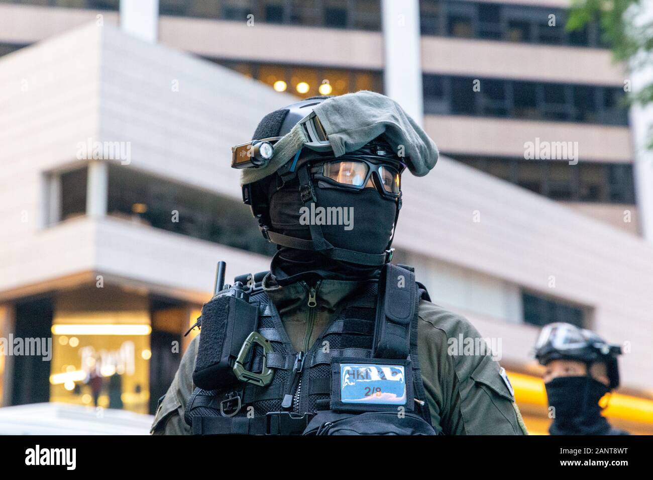 Hong Kong, China. 19th Jan, 2020. Police officer stands watch in Central at the Hong Kong Protest - Universal Seige on Communists Rally at Chater Garden, Central, Hong Kong. Credit: David Ogg/Alamy Live News Stock Photo