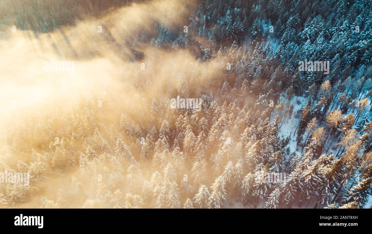 Aerial view snowfall over foggy hi-res stock photography and images - Alamy