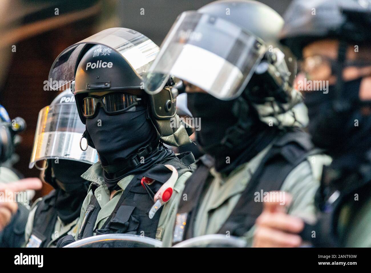 Hong Kong, China. 19th Jan, 2020. Police officers in full gear at the most recent Hong Kong Protest - Universal Seige on Communists Rally at Chater Garden, Central, Hong Kong. Credit: David Ogg/Alamy Live News Stock Photo