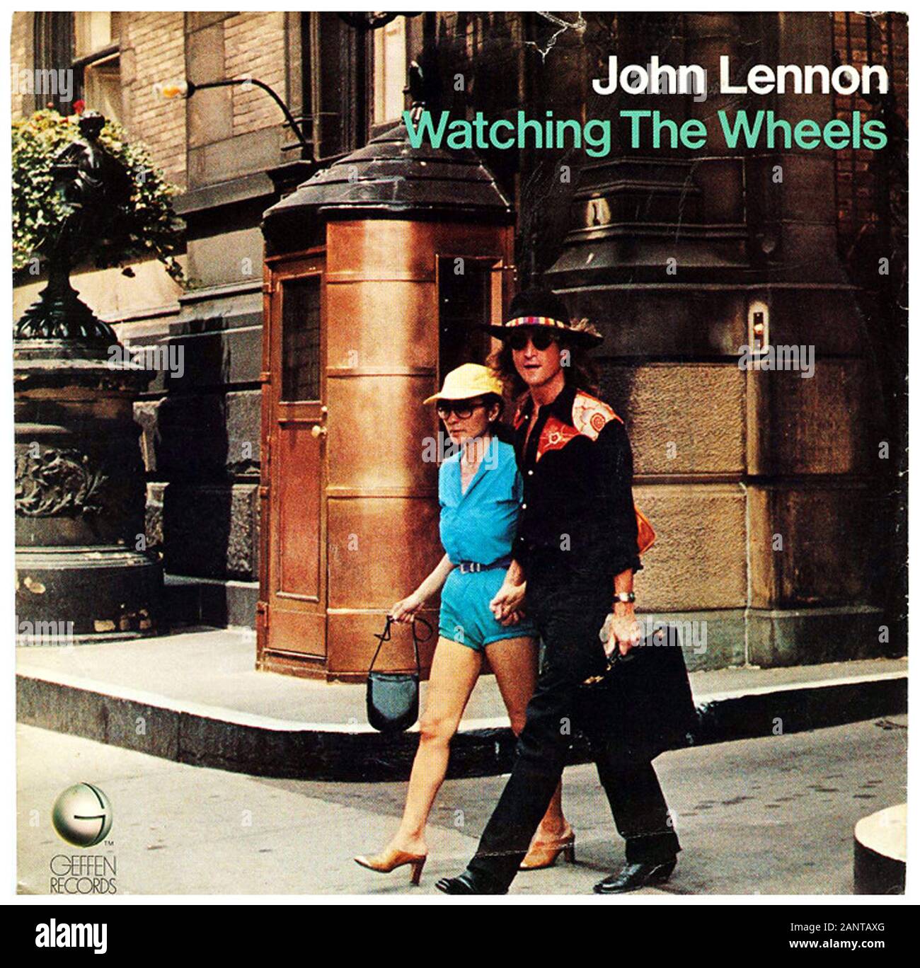 John Lennon - Watching The Wheels - Classic vintage vinyl album Stock Photo  - Alamy