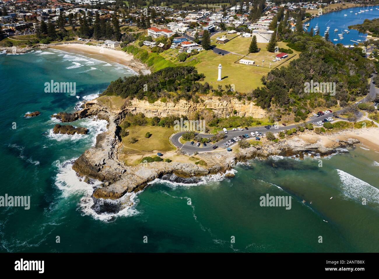 Aerial of Yamba's Clarence Head and its Lighthouse. Stock Photo