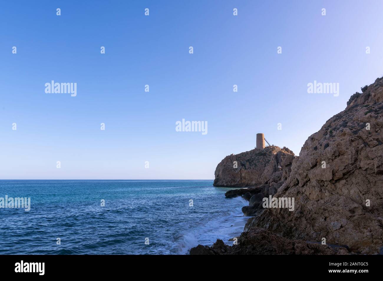Coastal control construction in Almeria, Spain. With sea and blue sky. Cut out of this beautiful coast. Stock Photo