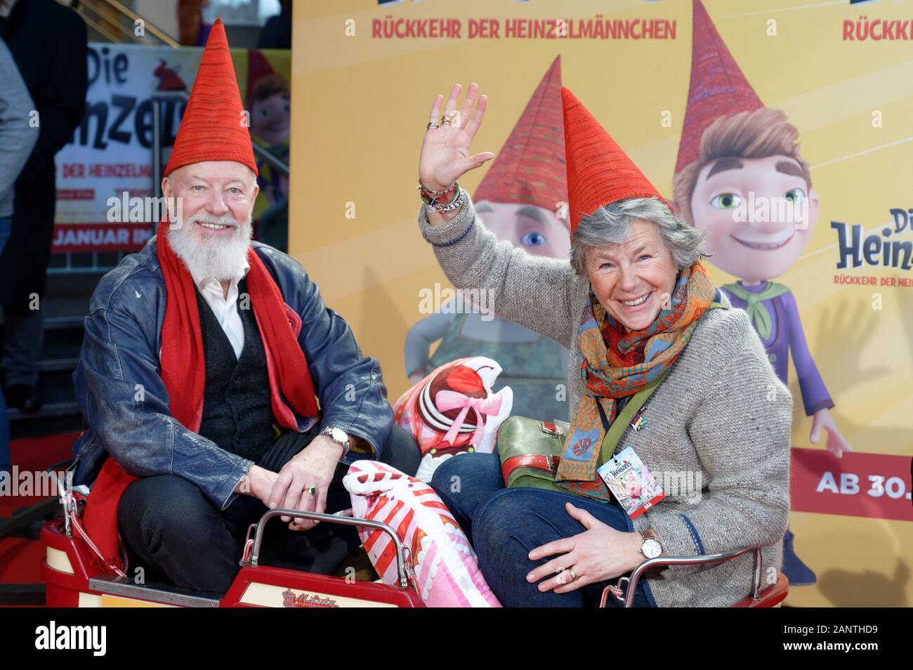 Cologne, Germany. 19th Jan, 2020. The actors Bill Mockridge (l) and Margie Kinsky (r) sit in a children's train before the premiere of the film 'The Heinzels - Return of the Brown Men'. The animated film will start in the cinemas on 30.01.2020. Credit: Henning Kaiser/dpa/Alamy Live News Stock Photo
