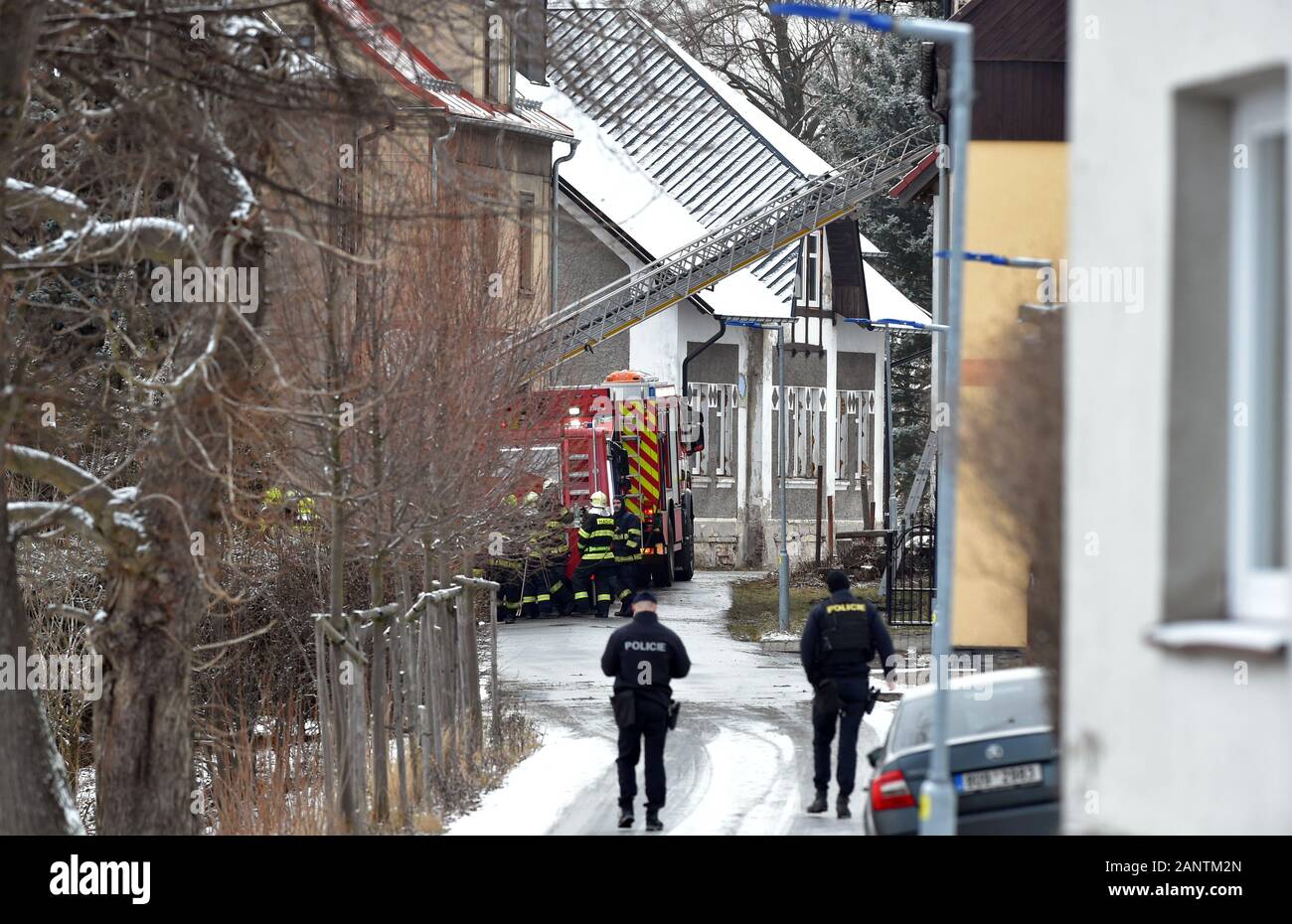 Vejprty, Czech Republic. 19th Jan, 2020. Firefighters stand in front of a house, where eight people with mental and combined impairment were killed died and another three were seriously injured in the fire in a home for them on Sunday, January 19, 2020, in Vejprty, Czech Republic. Credit: Slavomir Kubes/CTK Photo/Alamy Live News Stock Photo