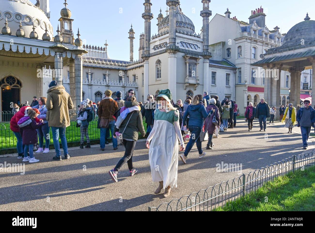 Brighton UK 19th January 2020 - Regency characters meet and greet the crowds as hundreds queue up on the free visit day at Brighton Royal Pavilion . To celebrate the purchase of the Royal Pavilion by Brighton in 1850 admission charges are waived one day a year : Credit Simon Dack / Alamy Live News Stock Photo