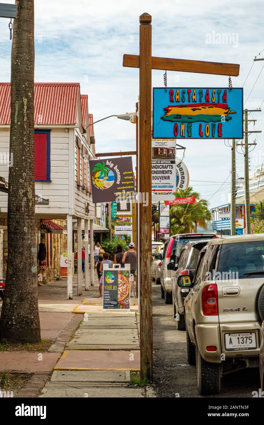 Rasta Pasta and other shop signs, Redcliffe Street, St Johns, Antigua Stock Photo