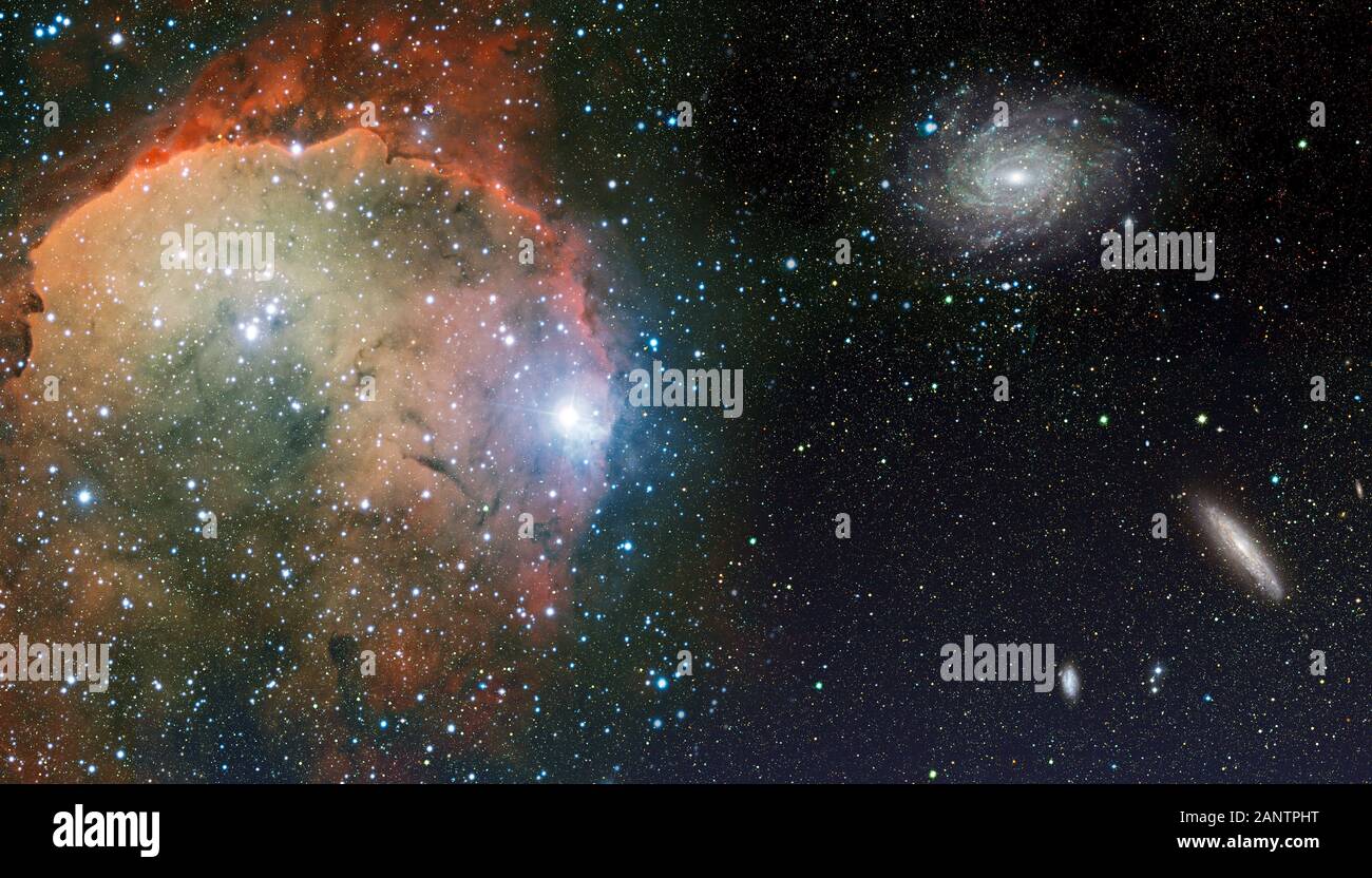 Cosmic landscape with nebula, stardust, spigal galaxy and bright shining stars Stock Photo