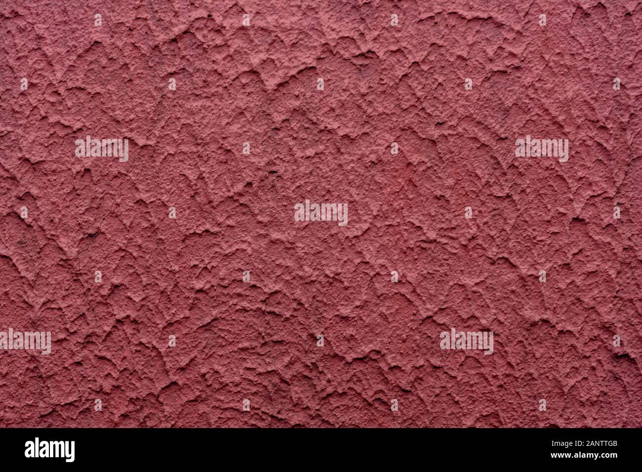 The texture of the facade of the wall. Putty close-up, very grainy. Stock photo of the front wall. Stock Photo