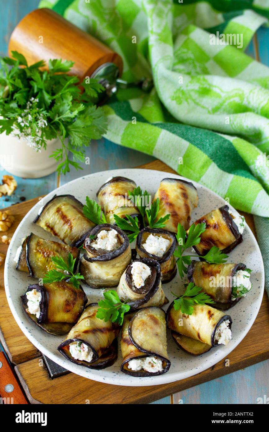 Appetizer stuffed eggplant. Grilled eggplant roll with feta cheese and