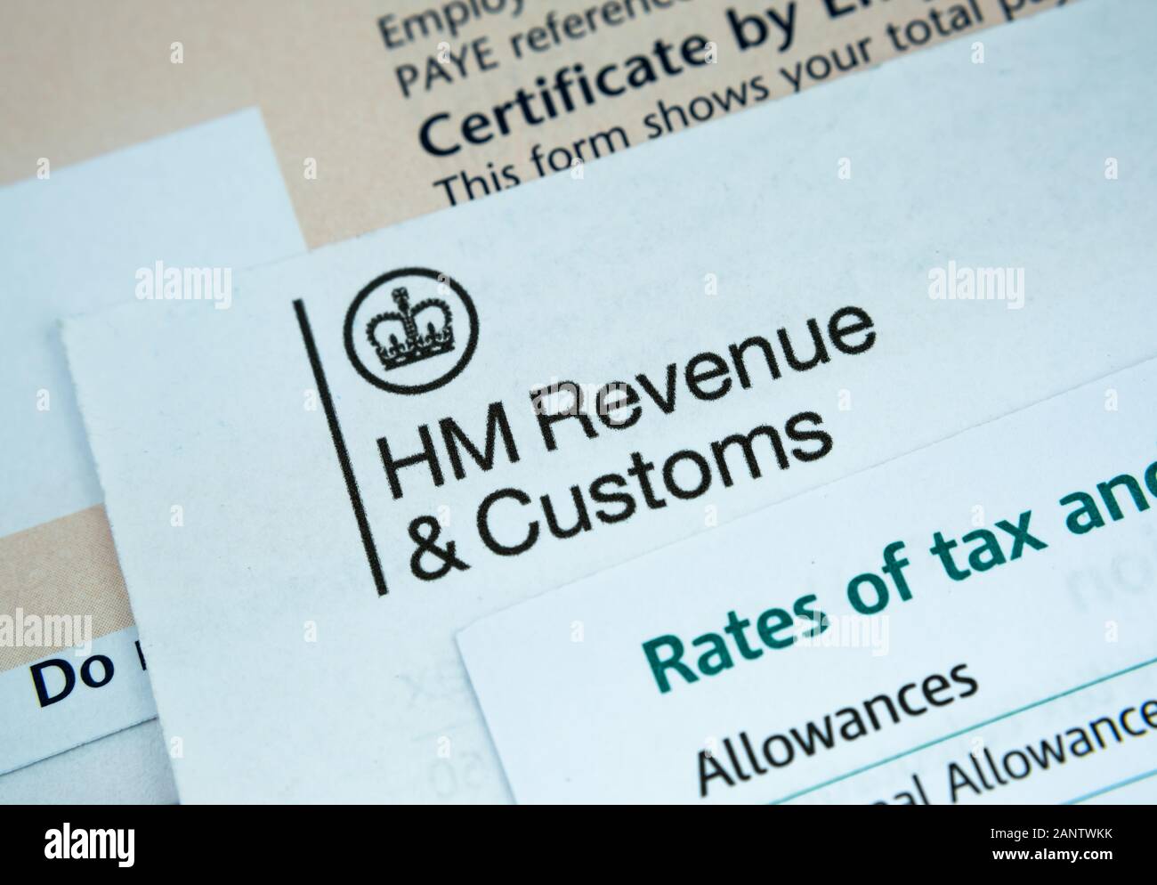 HMRC P60 End of Year Certificate and the letters about tax rates. Macro photo with selective focus. Stock Photo