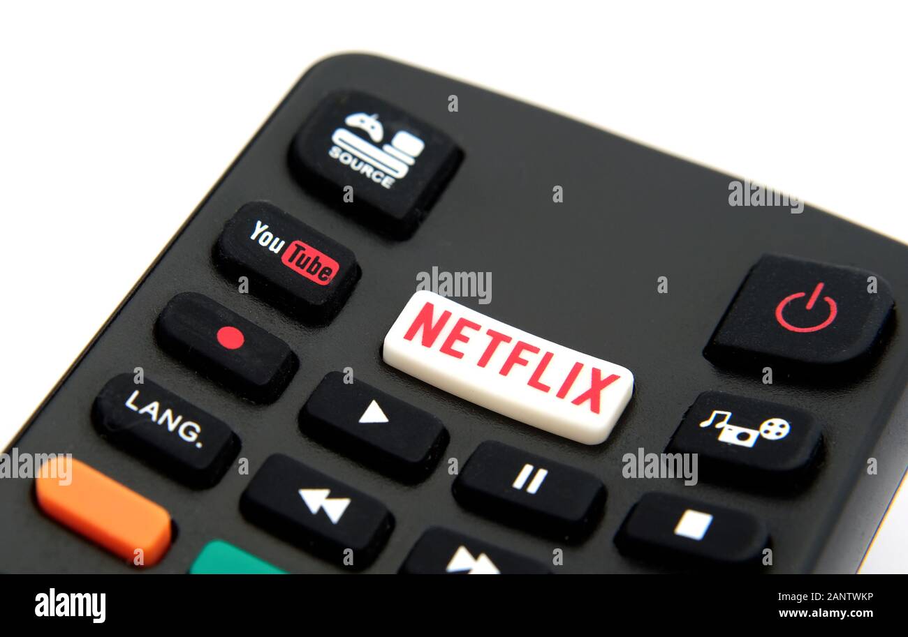 Netflix and YouTube buttons on the remote control from Hitachi Smart TV. Stock Photo