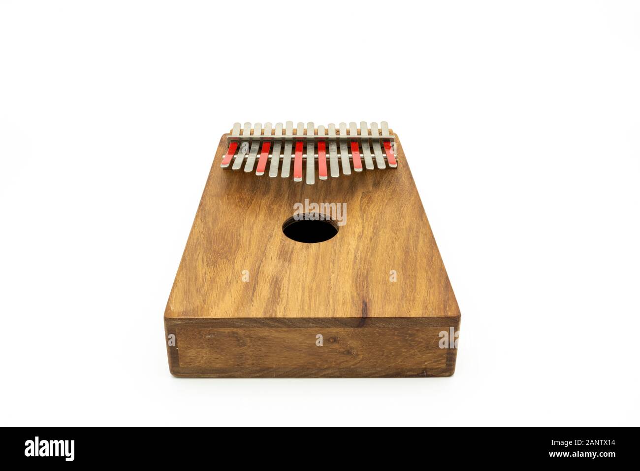 Details of a thumb piano (Kalimba, Mbira) with silver and red tines ...