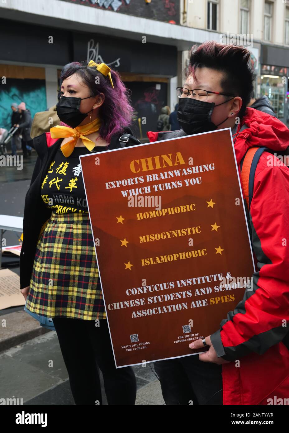 19th, January, 2020,  Glasgow, Scotland, UK. Students for 'Democracy for Hong Kong in Scotland'  protest in Glasgow city centre against the Chinese government's treatment of Hong Kong residents by depicting scenes of the unrest and HK police. A speaker from Amnesty International was also speaking at the event Stock Photo