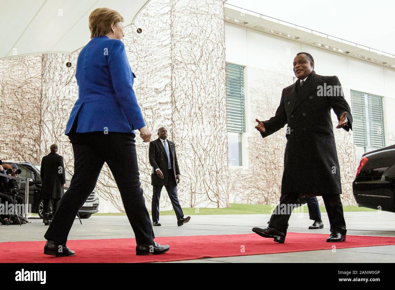 Berlin, Germany. 19th Jan, 2020. Federal Chancellor Angela Merkel (CDU) receives Denis Sassou Nguesso, President of the Republic of Congo, in front of the Federal Chancellery for the Libya Conference. The aim of the conference is a lasting ceasefire in the civil war country. Credit: Carsten Koall/dpa/Alamy Live News Stock Photo