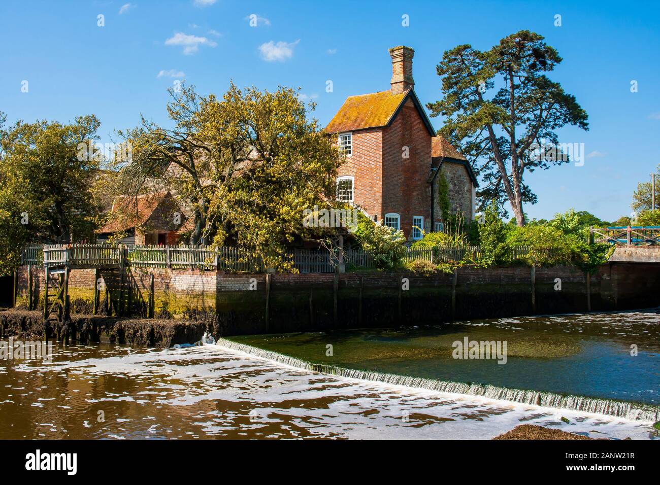 10 June 2015 An beautiful example of Elizabethan - Tudor architecture beside the River Beaulieu in Beaulieu Village Hampshire England Stock Photo