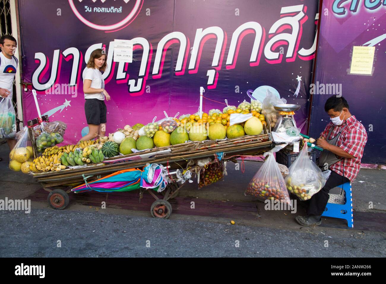 Chiang Mai Thailand fruits stall in street , seller with safety mask ...